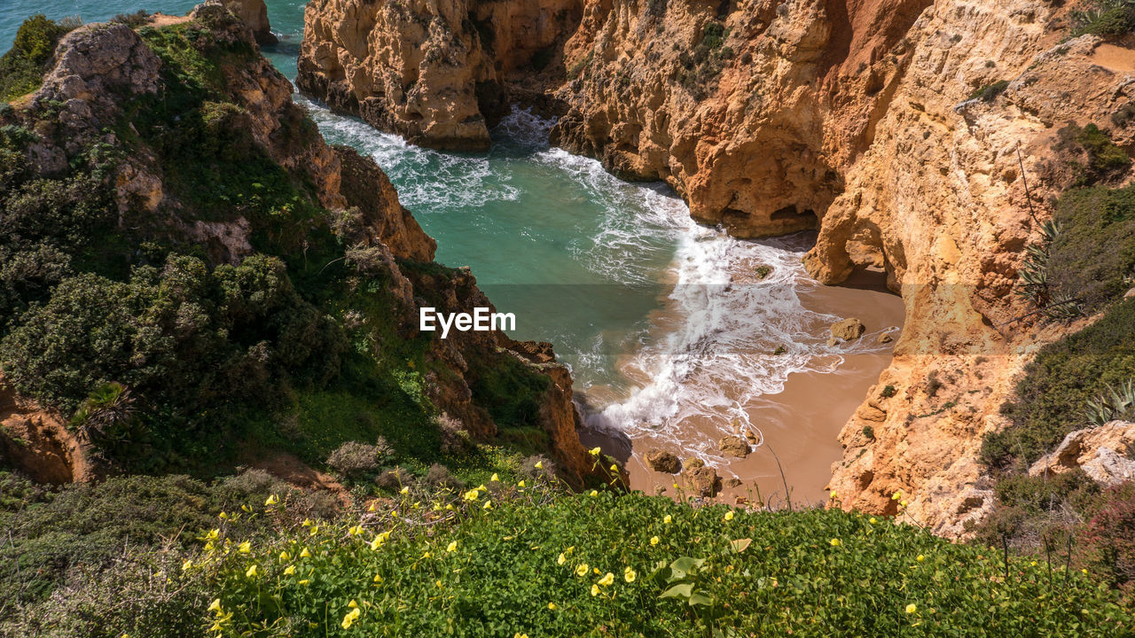 High angle view of rocks on beach