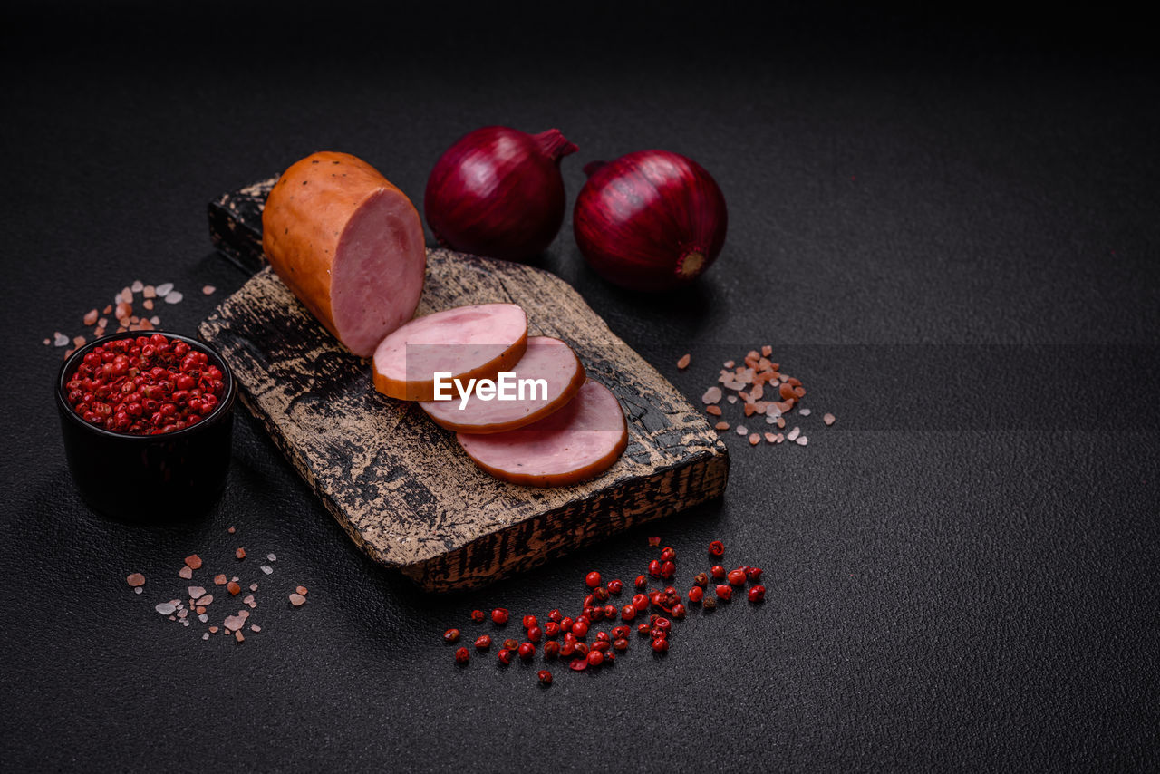 food and drink, food, still life photography, red, healthy eating, freshness, fruit, studio shot, wellbeing, indoors, still life, no people, black background, produce, high angle view, ingredient, berry, organic, spice, gray background, variation, gray, nut - food, nut, sweet food, copy space
