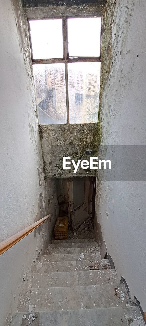 architecture, indoors, window, wall, abandoned, built structure, wall - building feature, no people, building, house, room, damaged, old, day, history, entrance, rundown, ruined, decline, home interior, dirt, deterioration, bunker, door