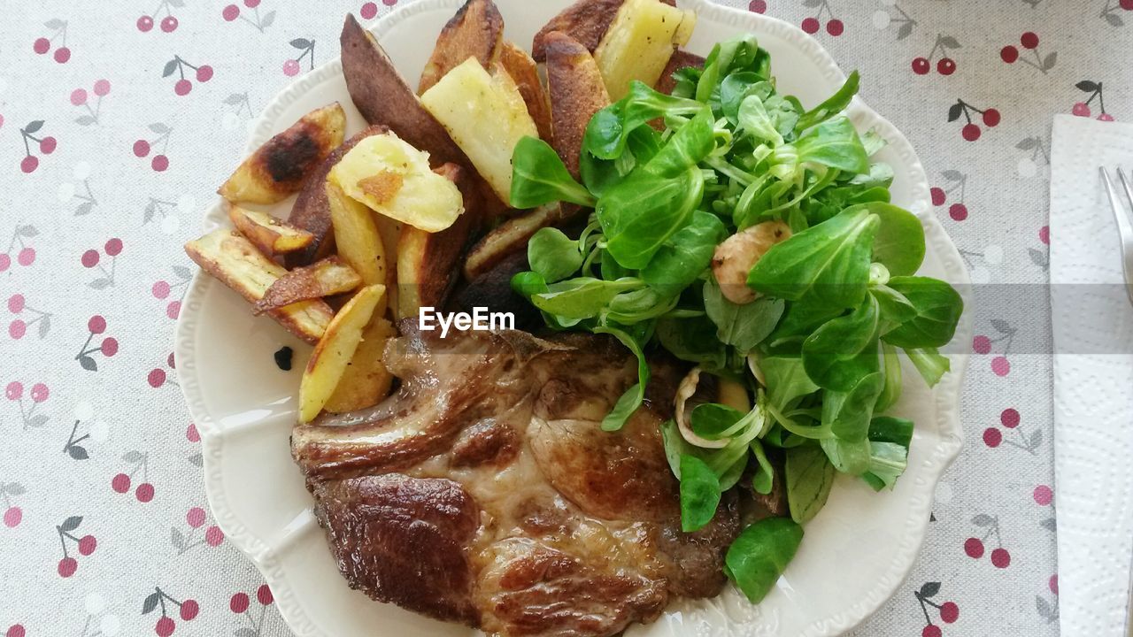 CLOSE-UP OF SERVED FOOD ON PLATE