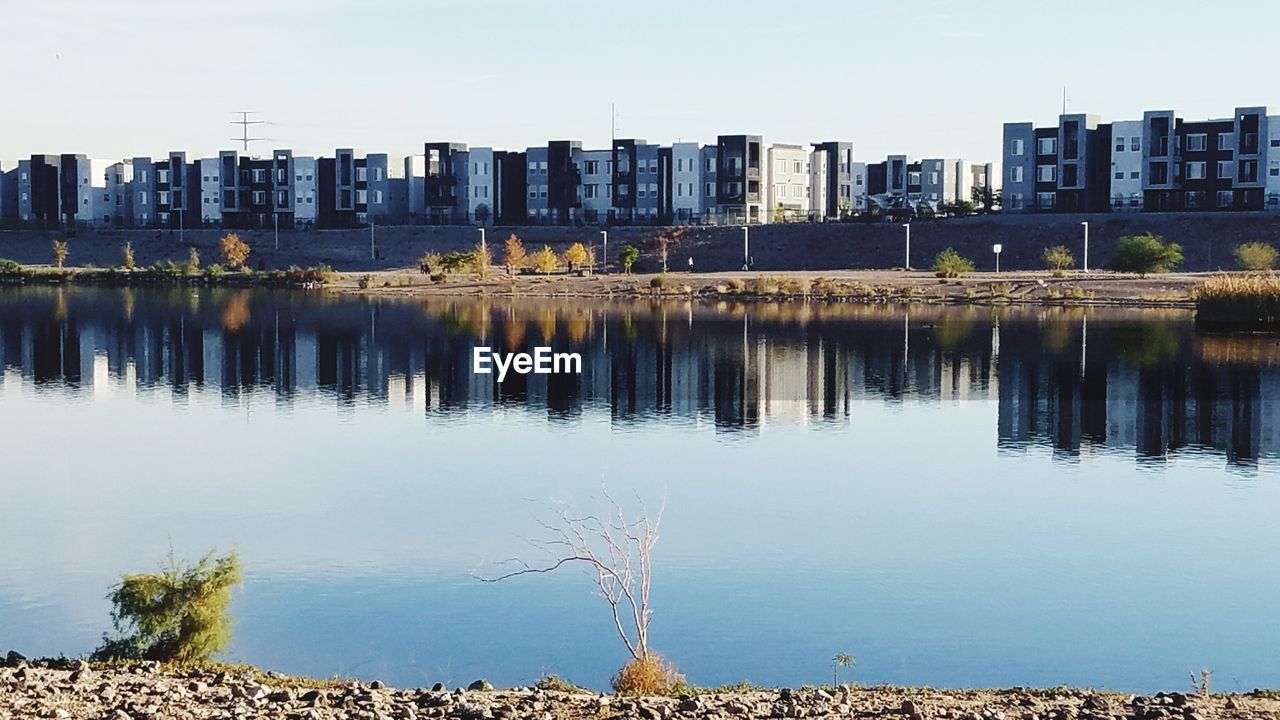 REFLECTION OF CITY IN WATER