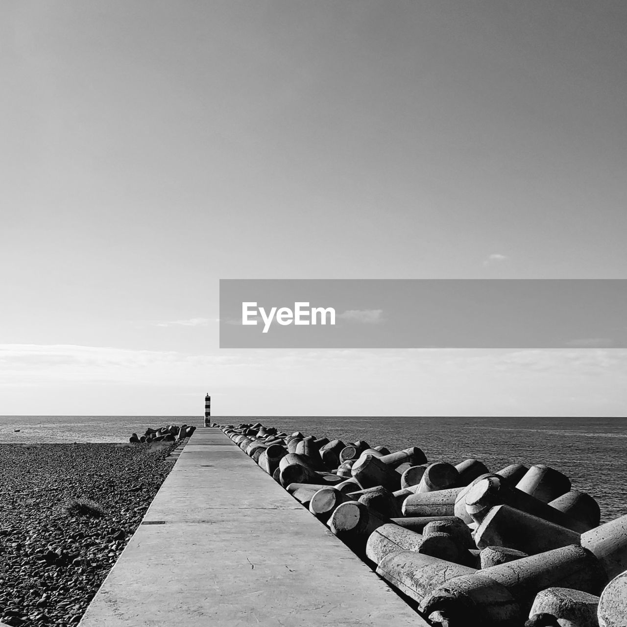 sky, sea, horizon over water, water, horizon, black and white, beach, nature, land, tranquility, monochrome, tranquil scene, monochrome photography, beauty in nature, scenics - nature, white, copy space, day, coast, shore, black, ocean, the way forward, relaxation, outdoors, clear sky, sunlight, idyllic, no people, cloud, non-urban scene, holiday, vacation, trip, travel destinations