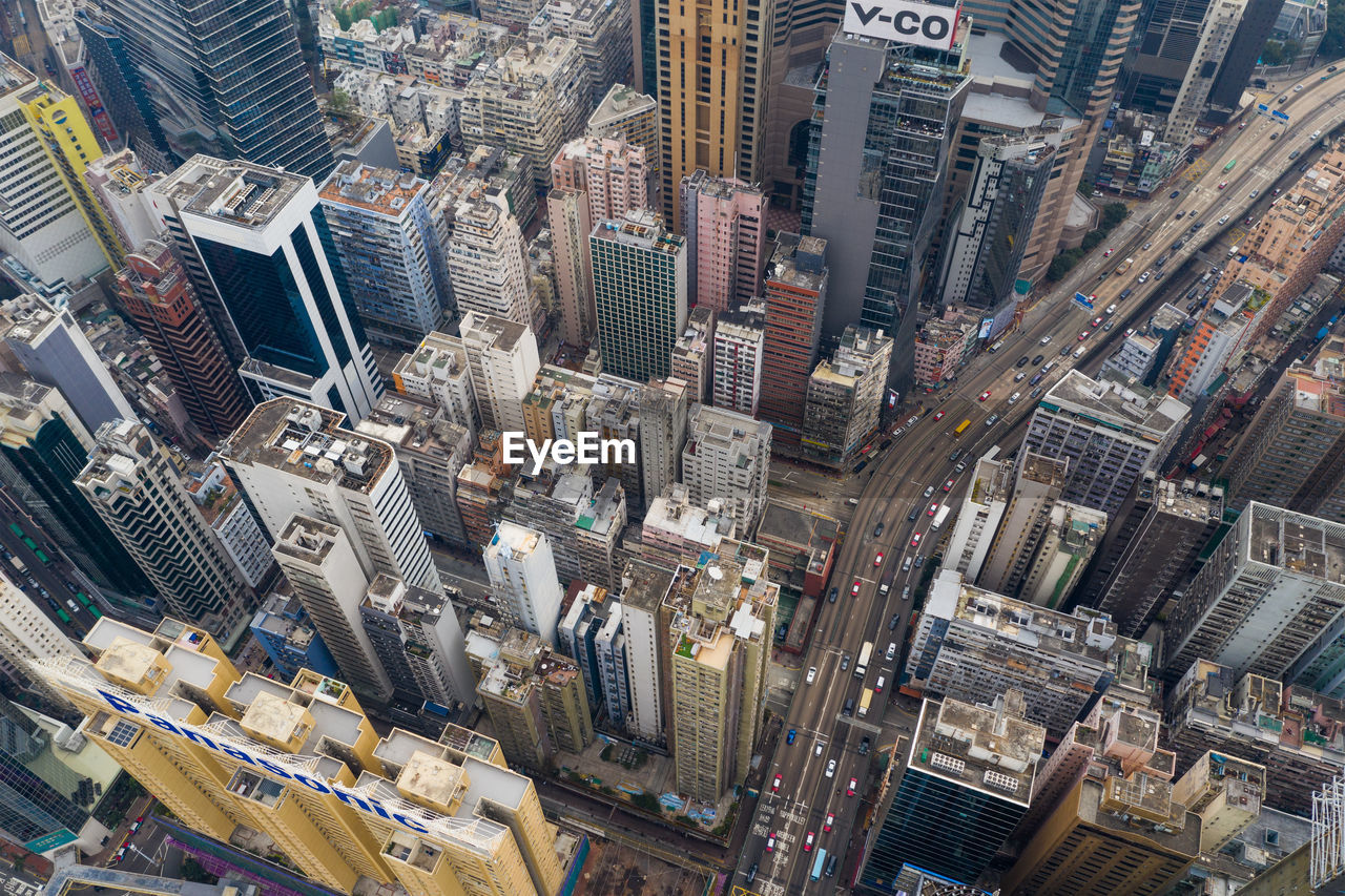 HIGH ANGLE VIEW OF MODERN CITYSCAPE