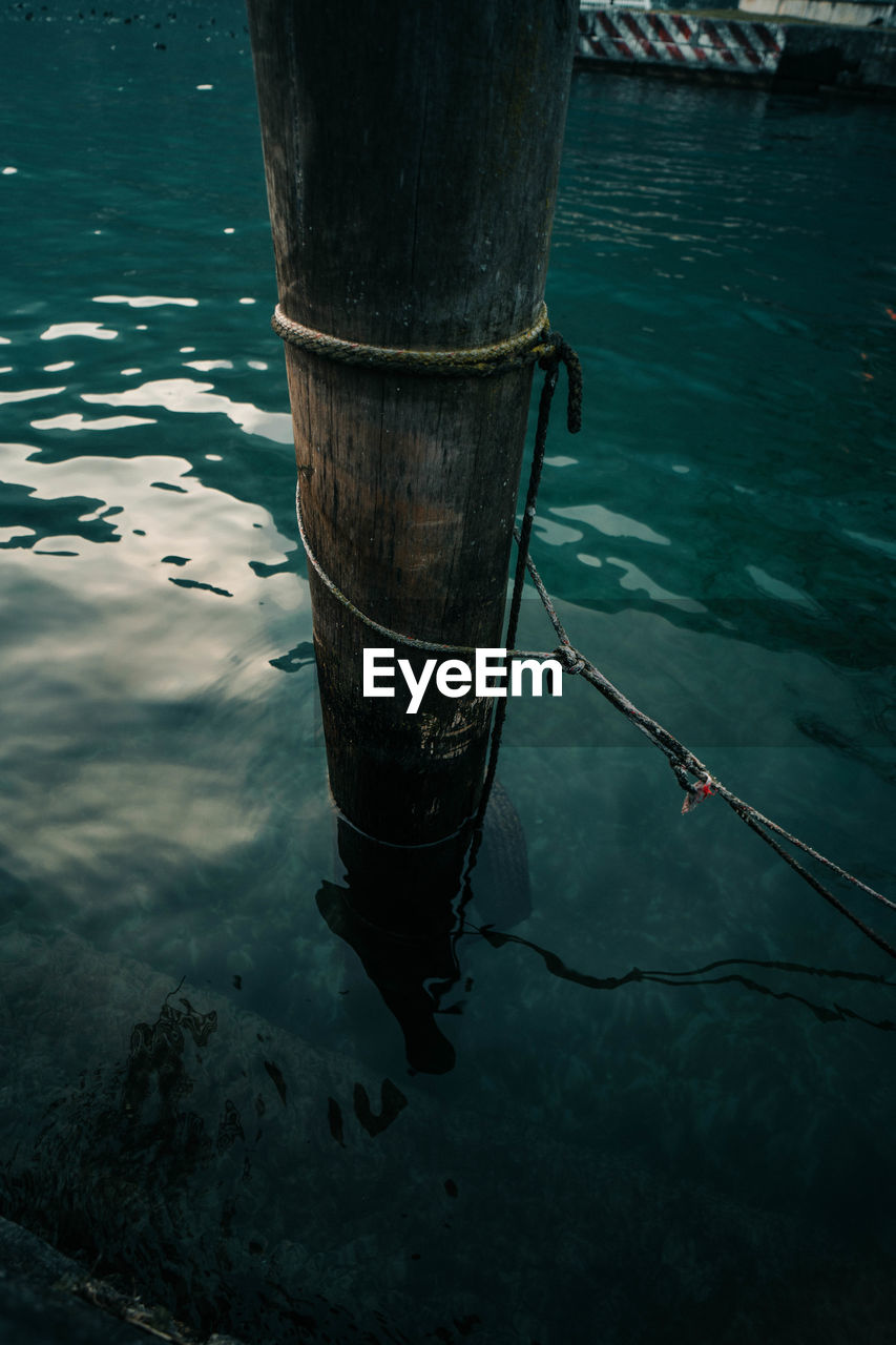 High angle view of wooden post in sea