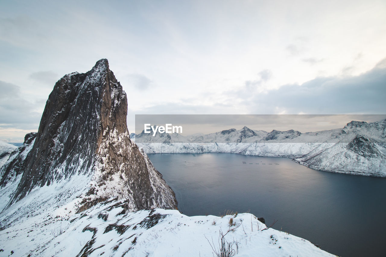 Mountain resembling a frosty rocky tooth on the senja peninsula called segla in northern norway. 