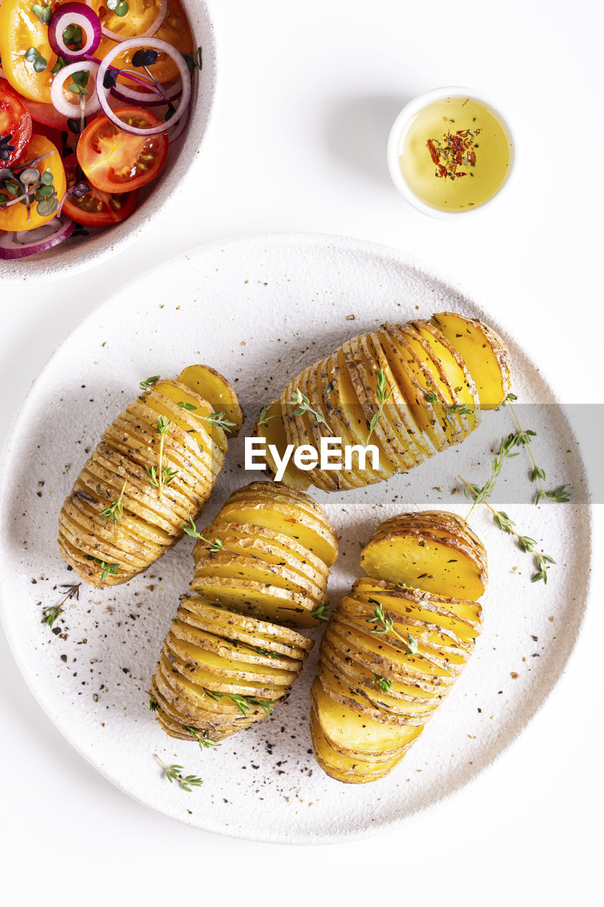 Grilled potato with thyme, pepper and sauce