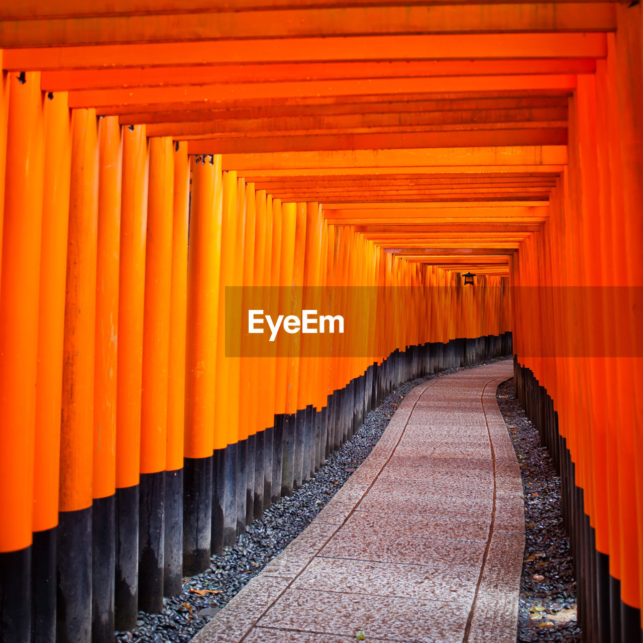 Orange torii gates entrance of fushimi inari-taisha