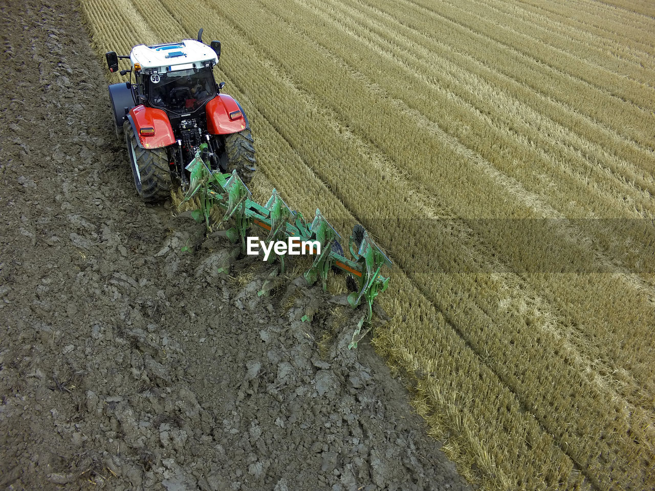 High angle view of tractor on agricultural field