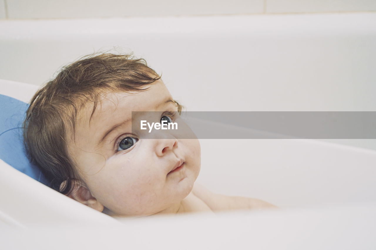 Close-up of baby at bathroom