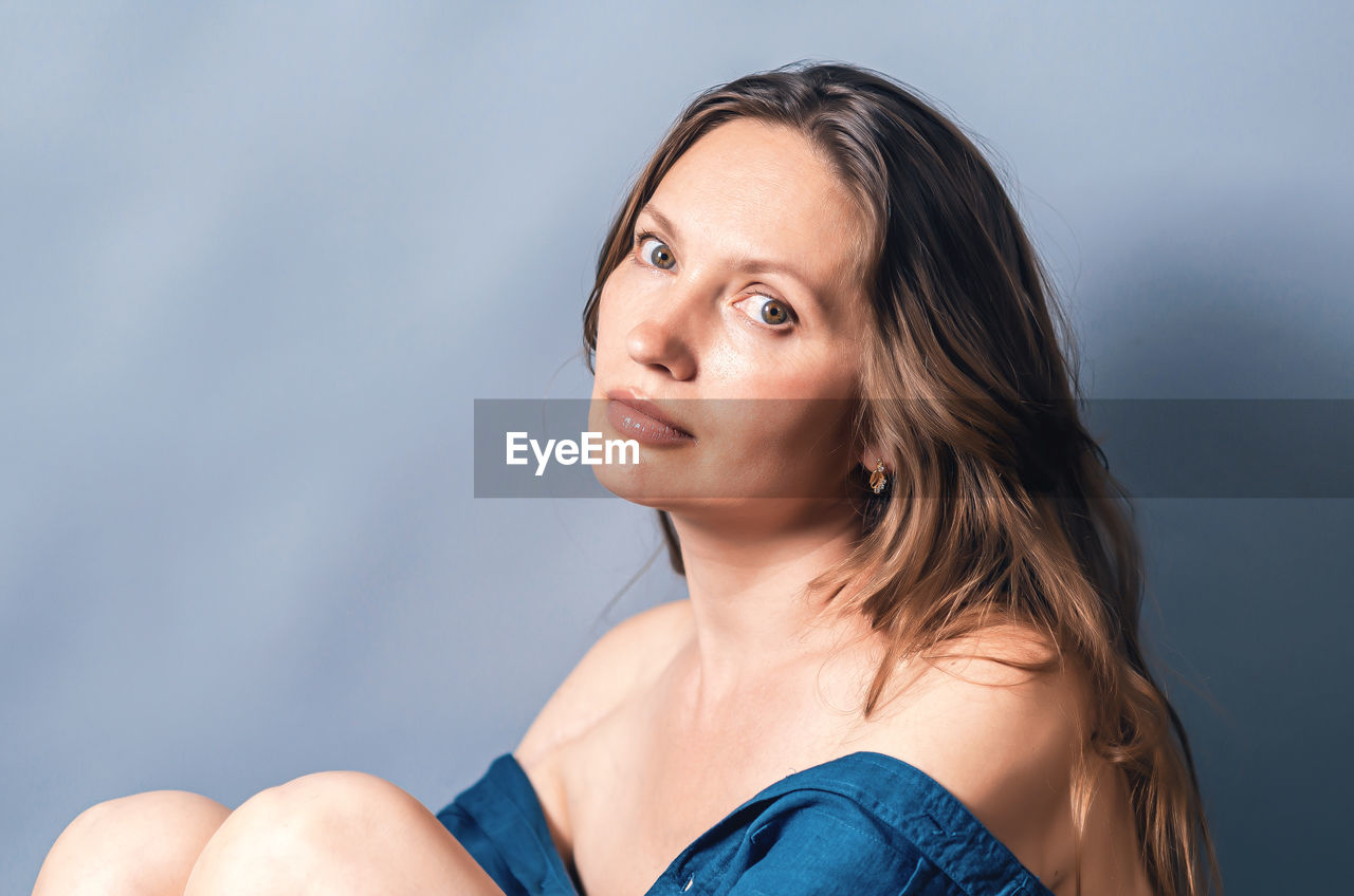 Portrait of woman head turned sideways up, close-up.