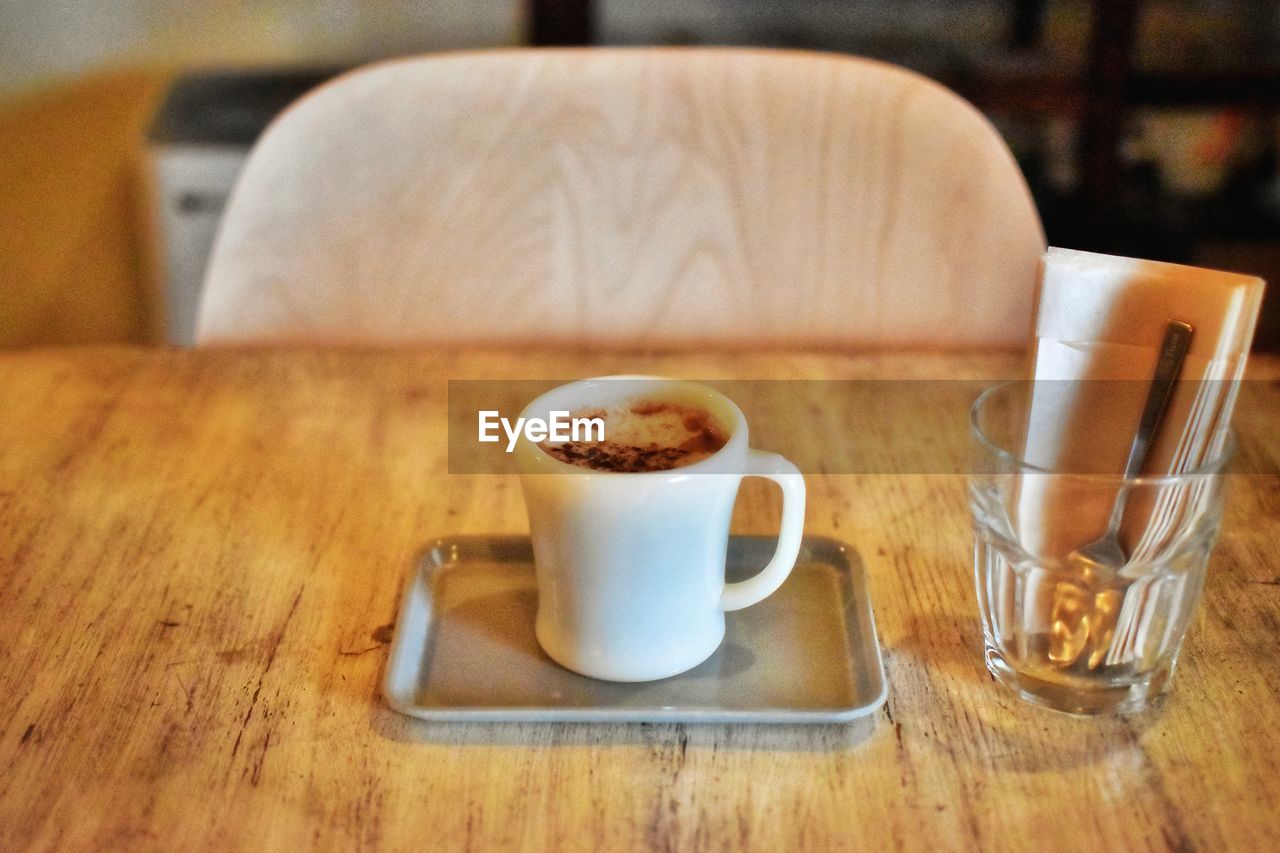 close-up of coffee cup on table