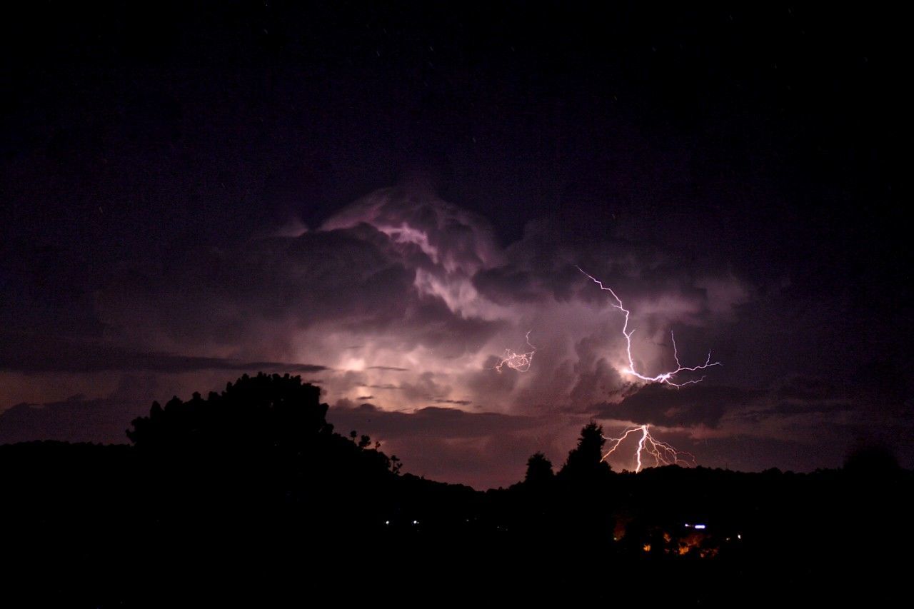 LOW ANGLE VIEW OF LIGHTNING IN SKY