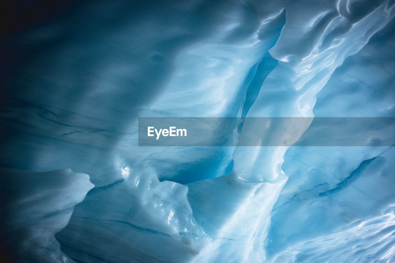 VIEW OF BLUE ICE ON ROAD