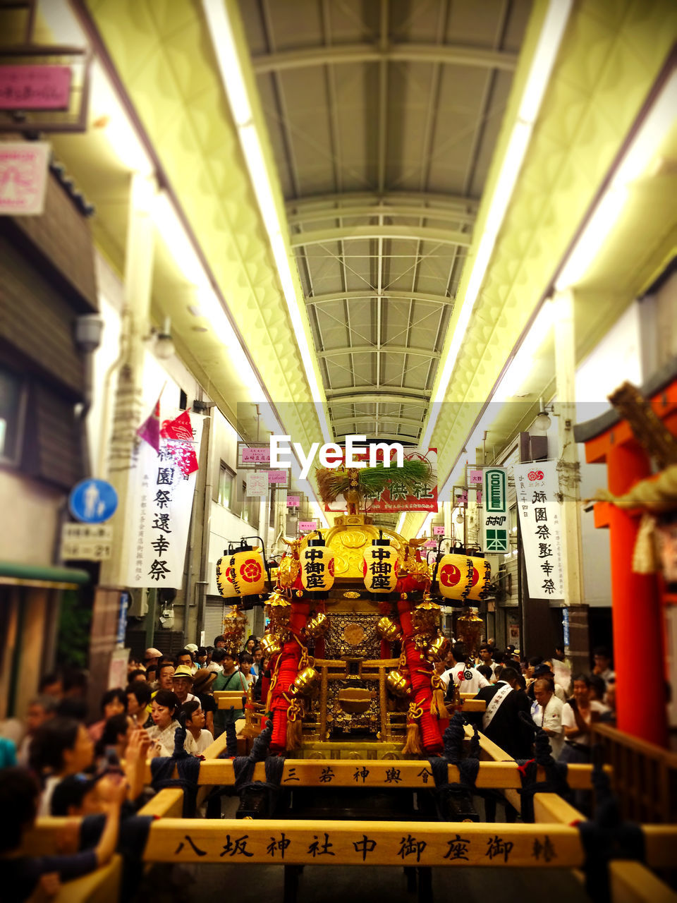 PEOPLE WAITING IN SUBWAY STATION