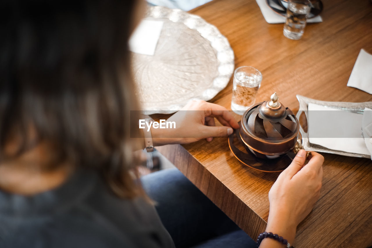 Girl drinking turkish coffee