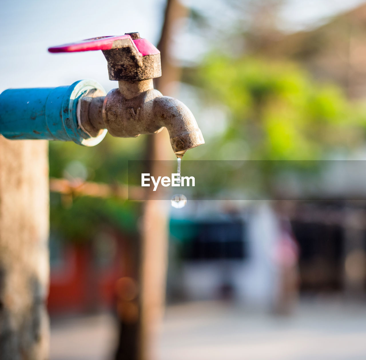 Close-up of water falling from faucet