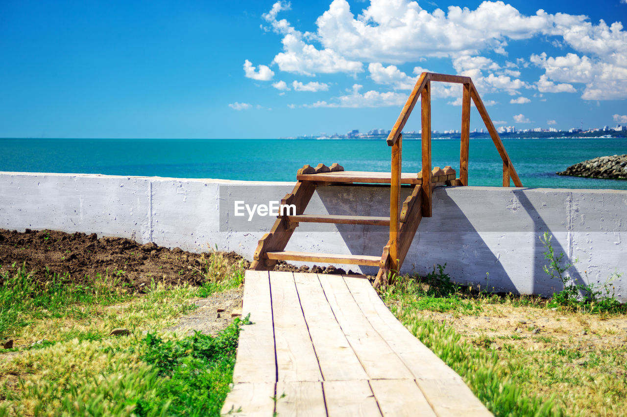 Wooden stairway to beautiful tropical beach. landscape