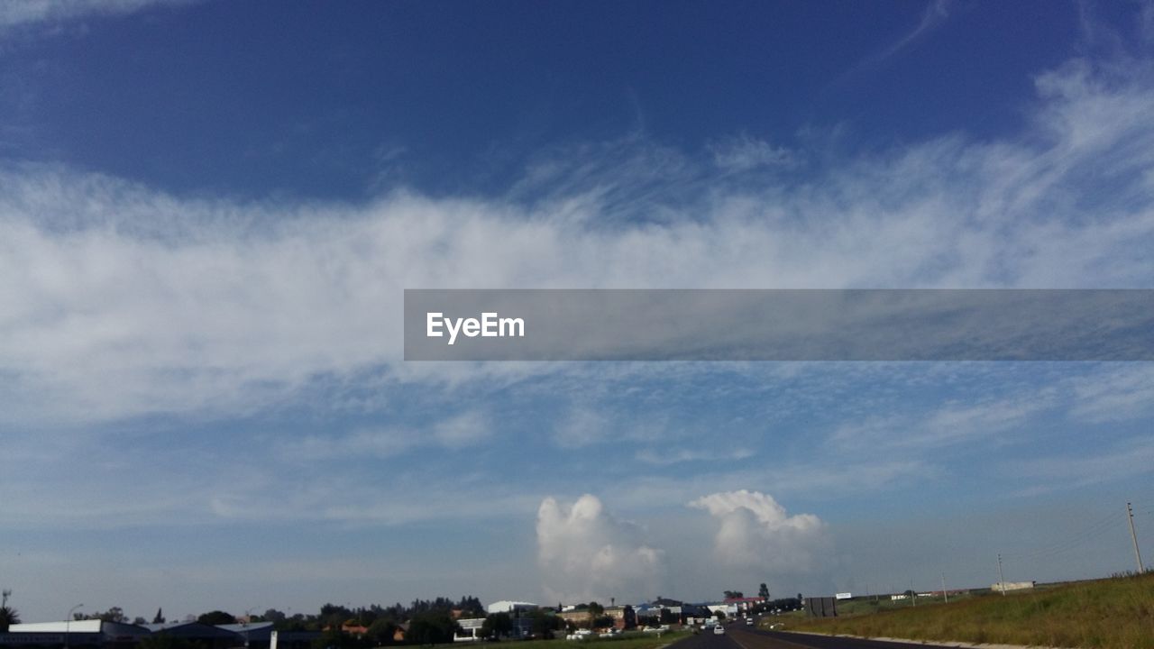 VIEW OF CLOUDY SKY OVER CLOUDS