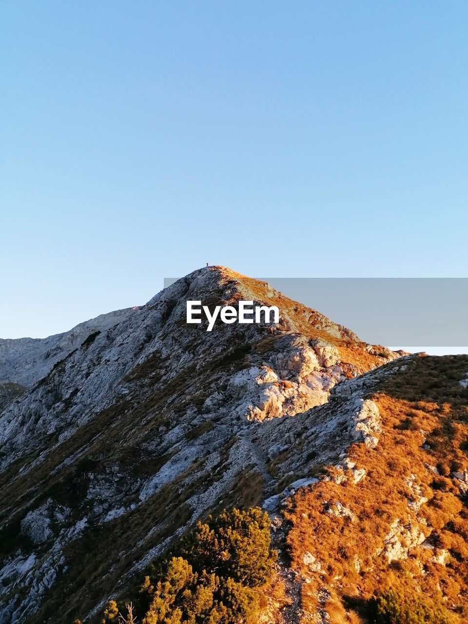 Low angle view of rock formations against clear sky