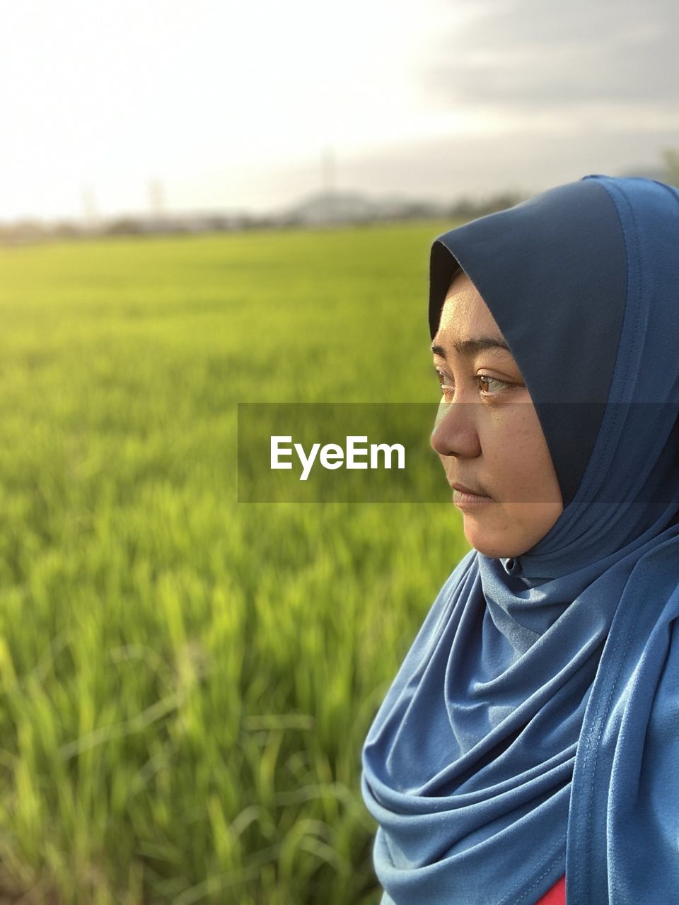Portrait of woman on padi field