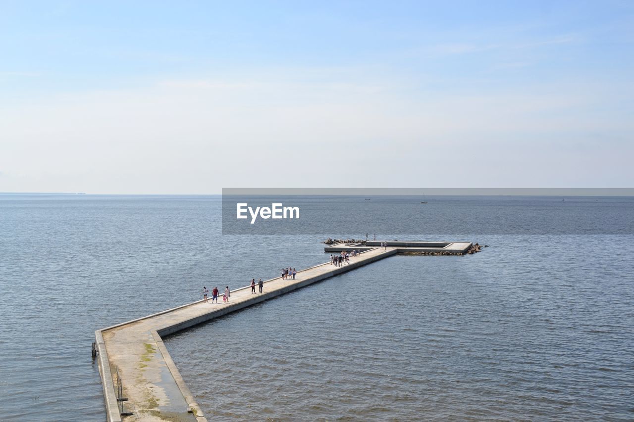 SCENIC VIEW OF PIER ON SEA AGAINST SKY