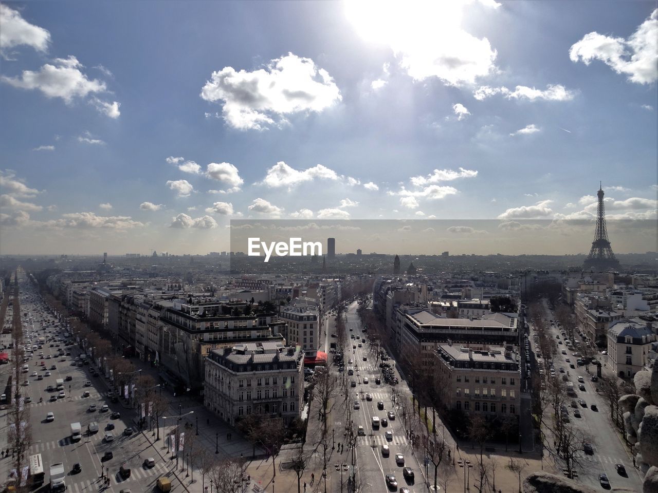 Cityscape with eiffel tower against sky