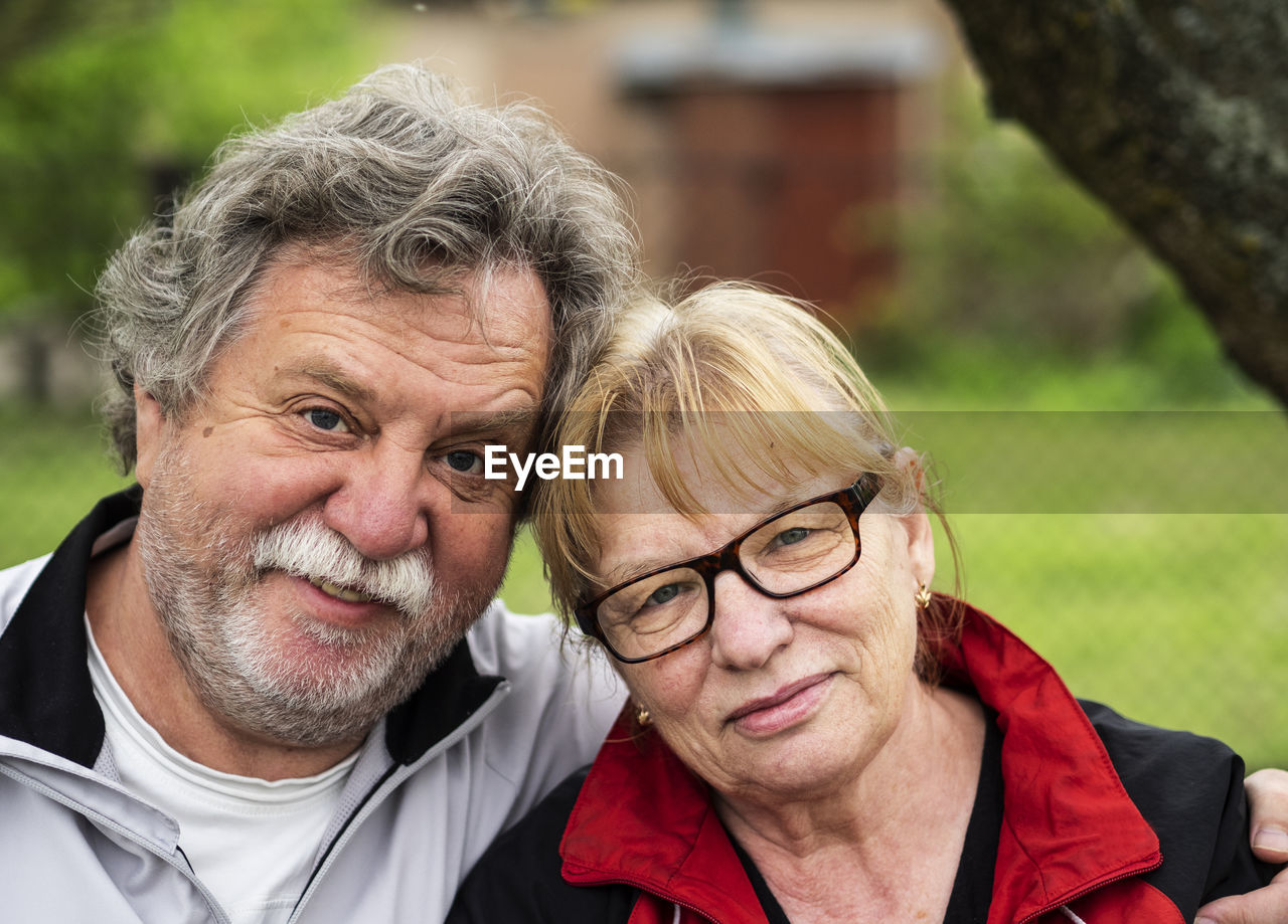 Close-up portrait of couple in park