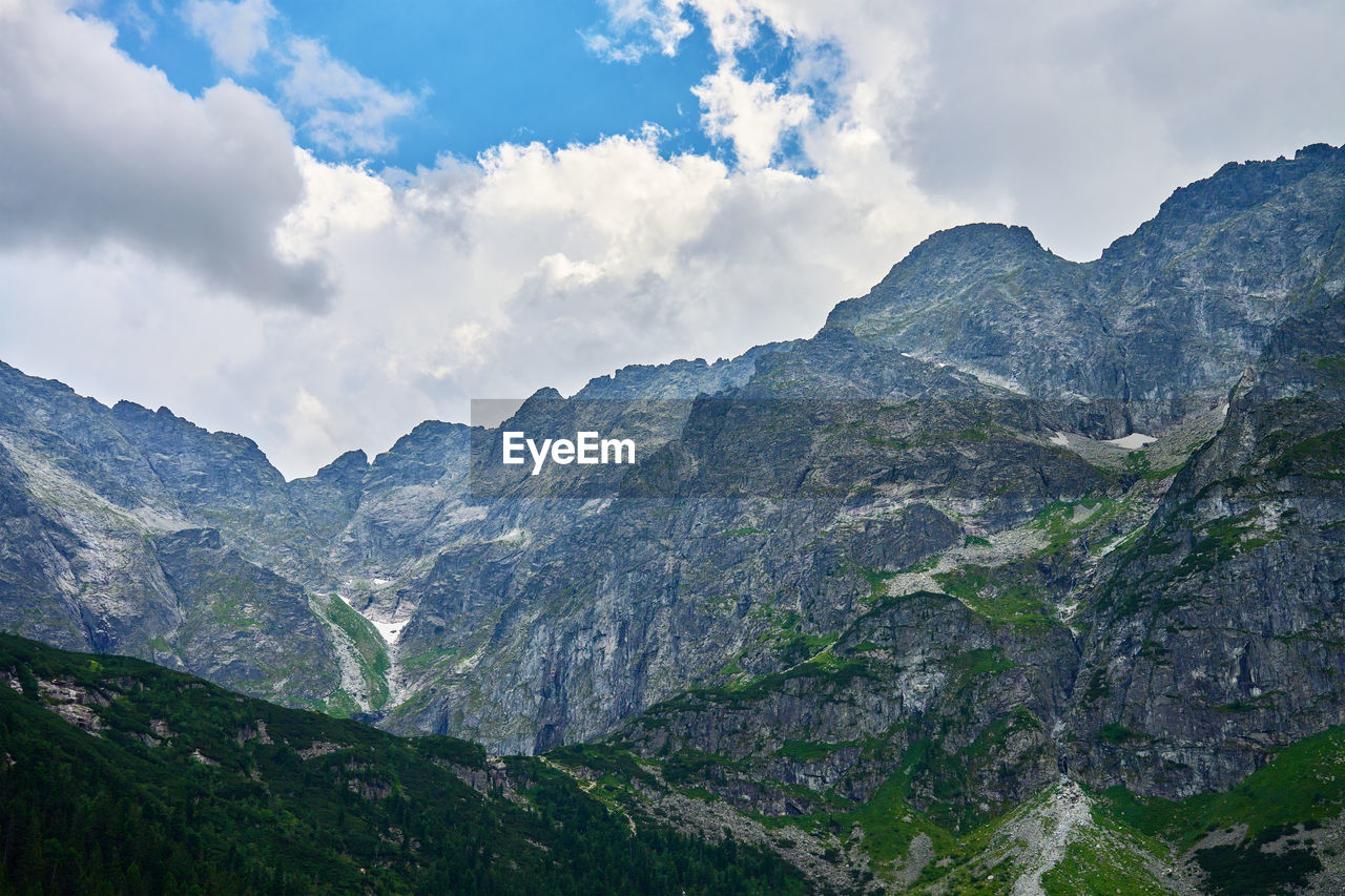 Mountains range near beautiful lake. tatra national park in poland. morskie oko or sea eye lake