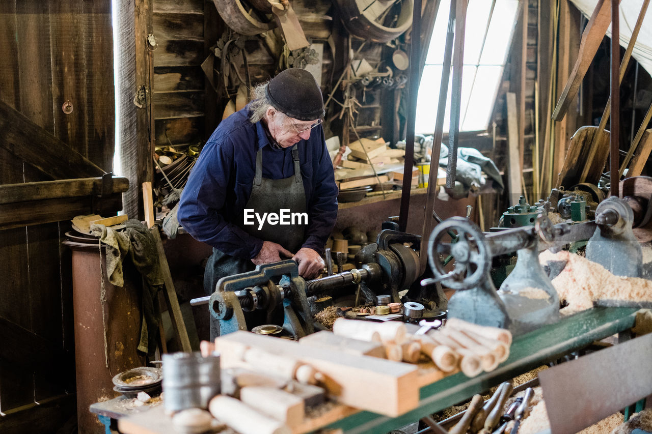 MAN WORKING IN FACTORY