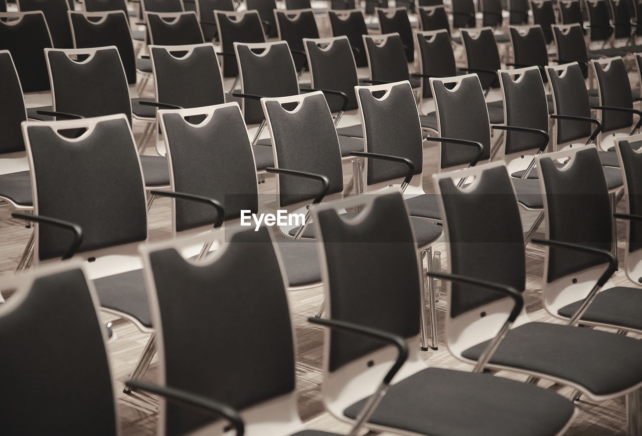 Full frame shot of empty chairs arranged