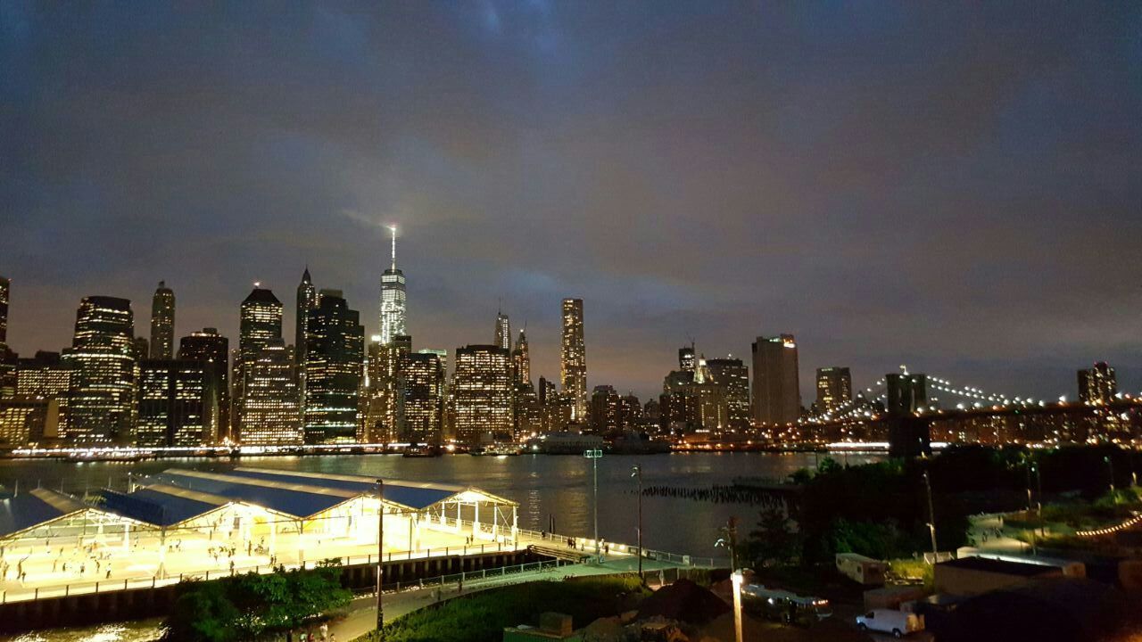 ILLUMINATED CITYSCAPE AT NIGHT