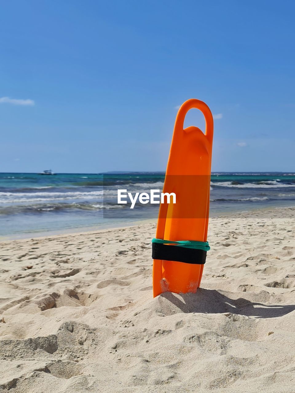 beach, land, sea, sand, water, sky, nature, ocean, surfing equipment, body of water, shore, horizon over water, wave, blue, horizon, scenics - nature, beauty in nature, summer, tranquility, coast, vacation, trip, surfboard, sunlight, holiday, day, no people, sunny, tranquil scene, outdoors, absence, orange color, sports, clear sky, relaxation, wind wave, motion, travel destinations, chair, idyllic, lifeguard, water sports, copy space