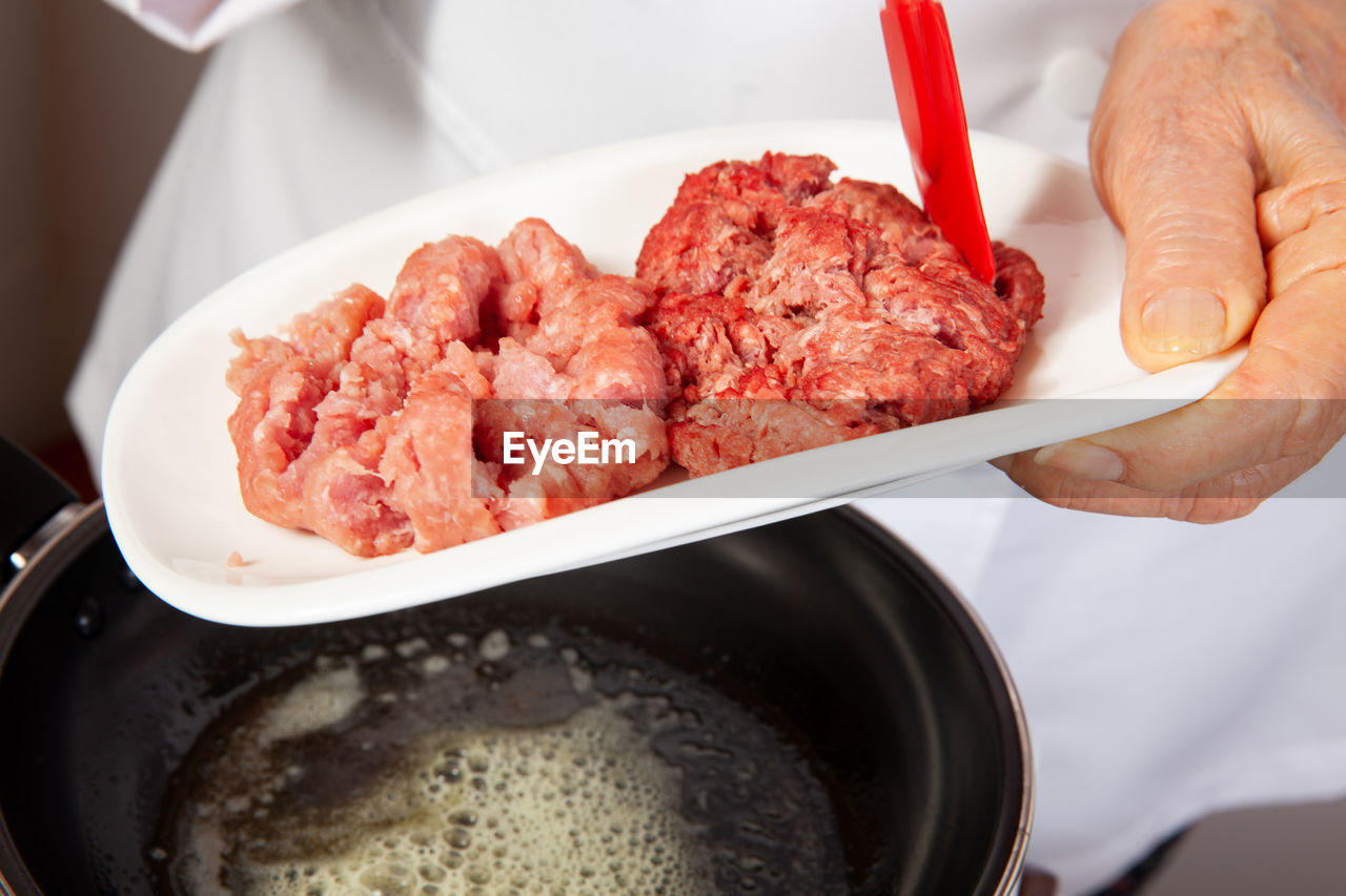 Preparation of ground beef with the traditional colombian hogao or criollo sauce