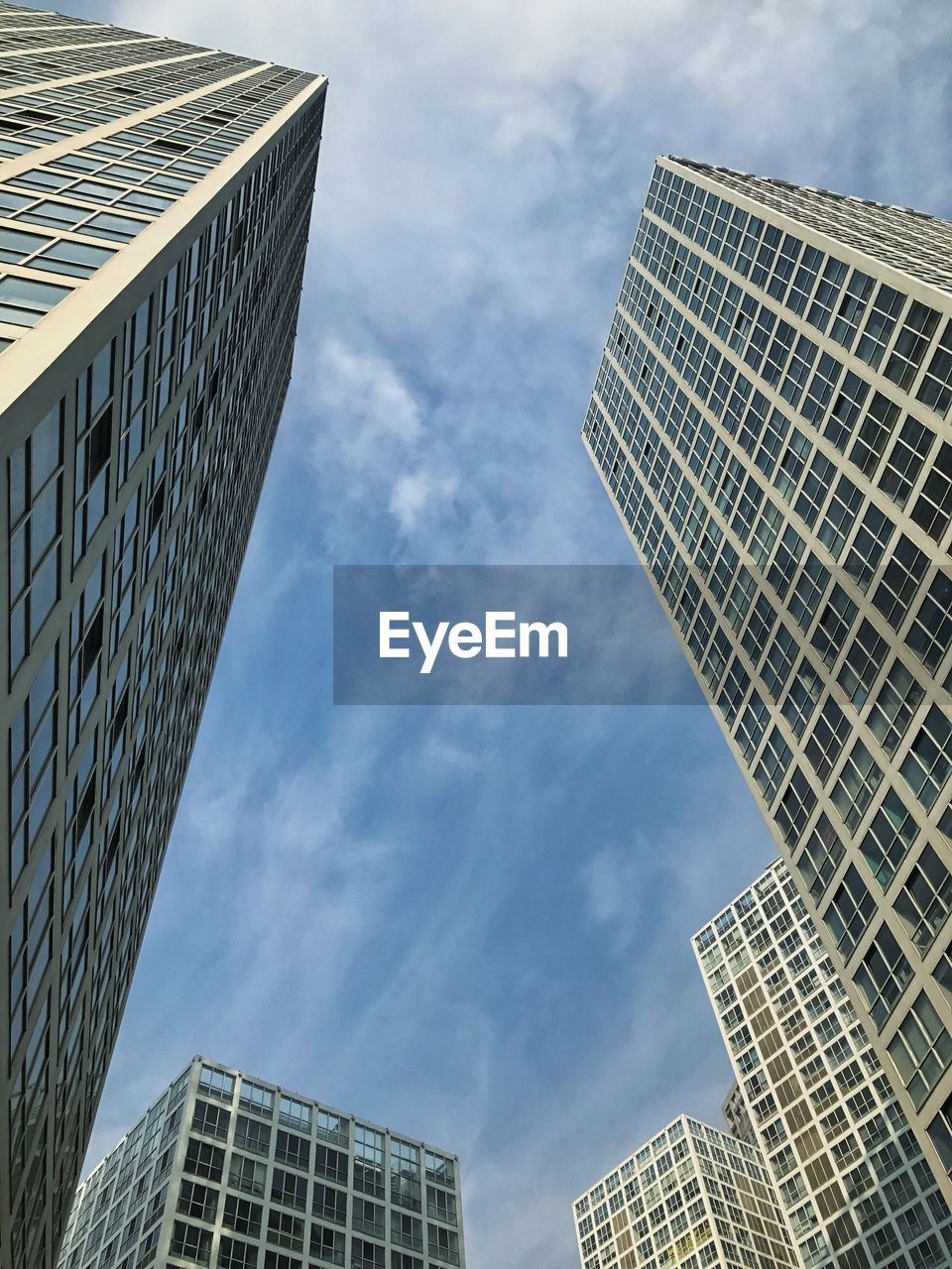 Low angle view of skyscrapers against sky