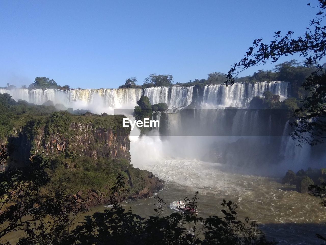 SCENIC VIEW OF WATERFALL