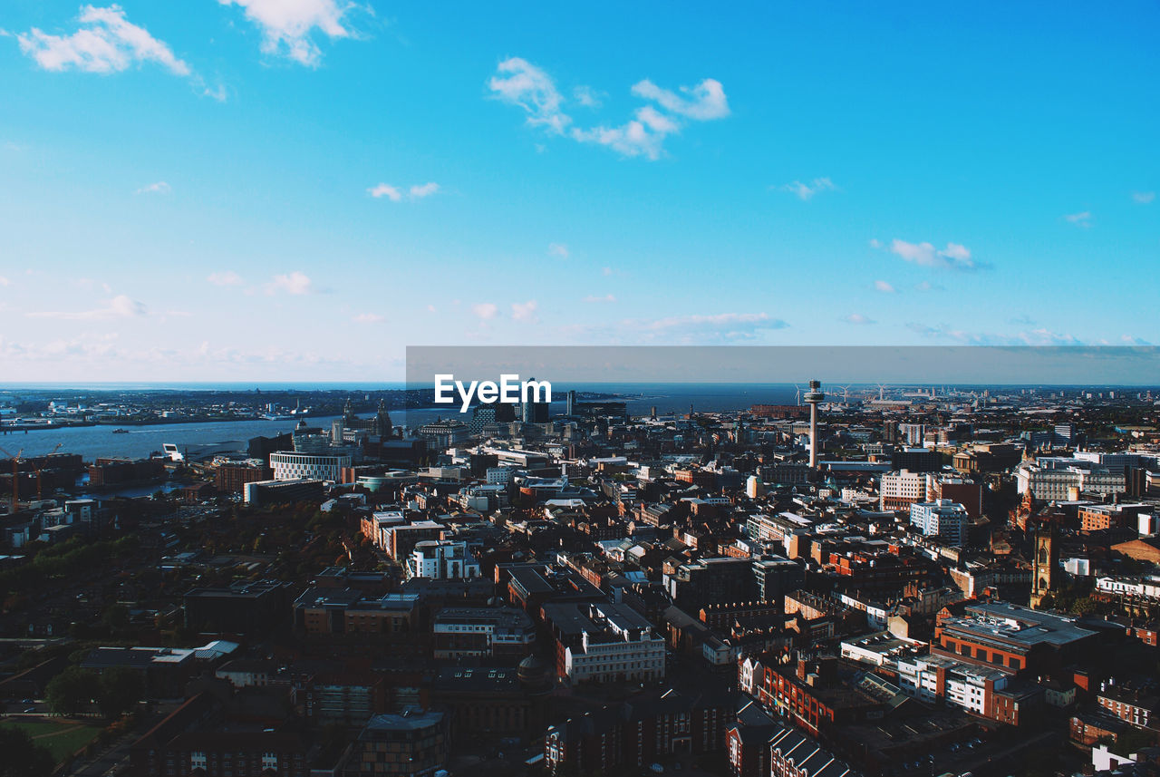 Aerial view of cityscape against sky