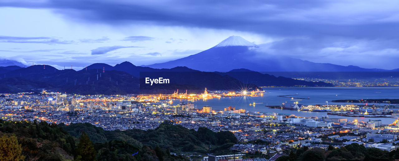 High angle view of city by sea and fuji mountain backgrounds 