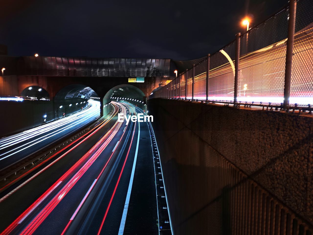 high angle view of light trails on bridge