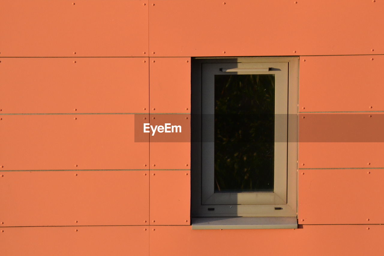 Window in orange cladding