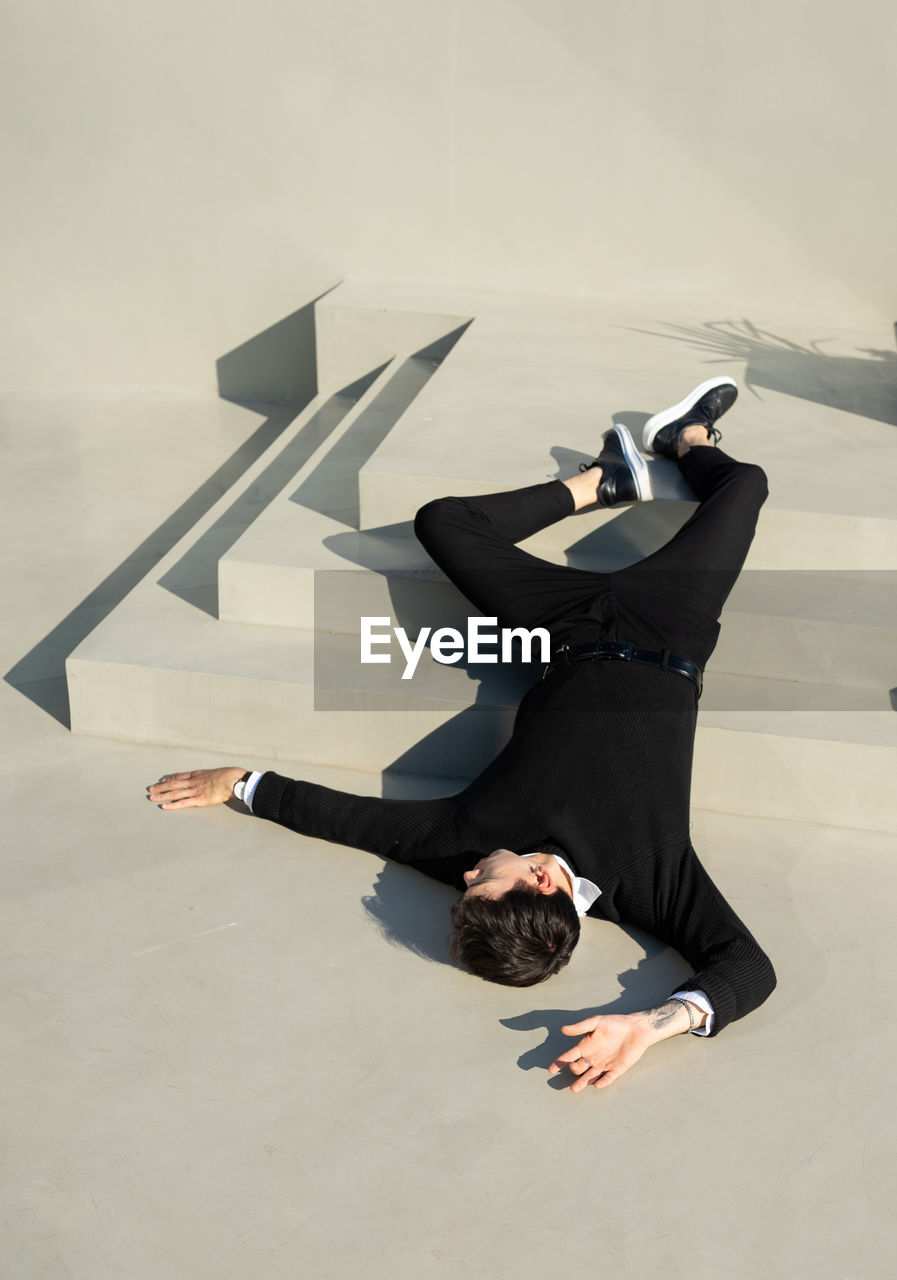 Man  lying down on floor