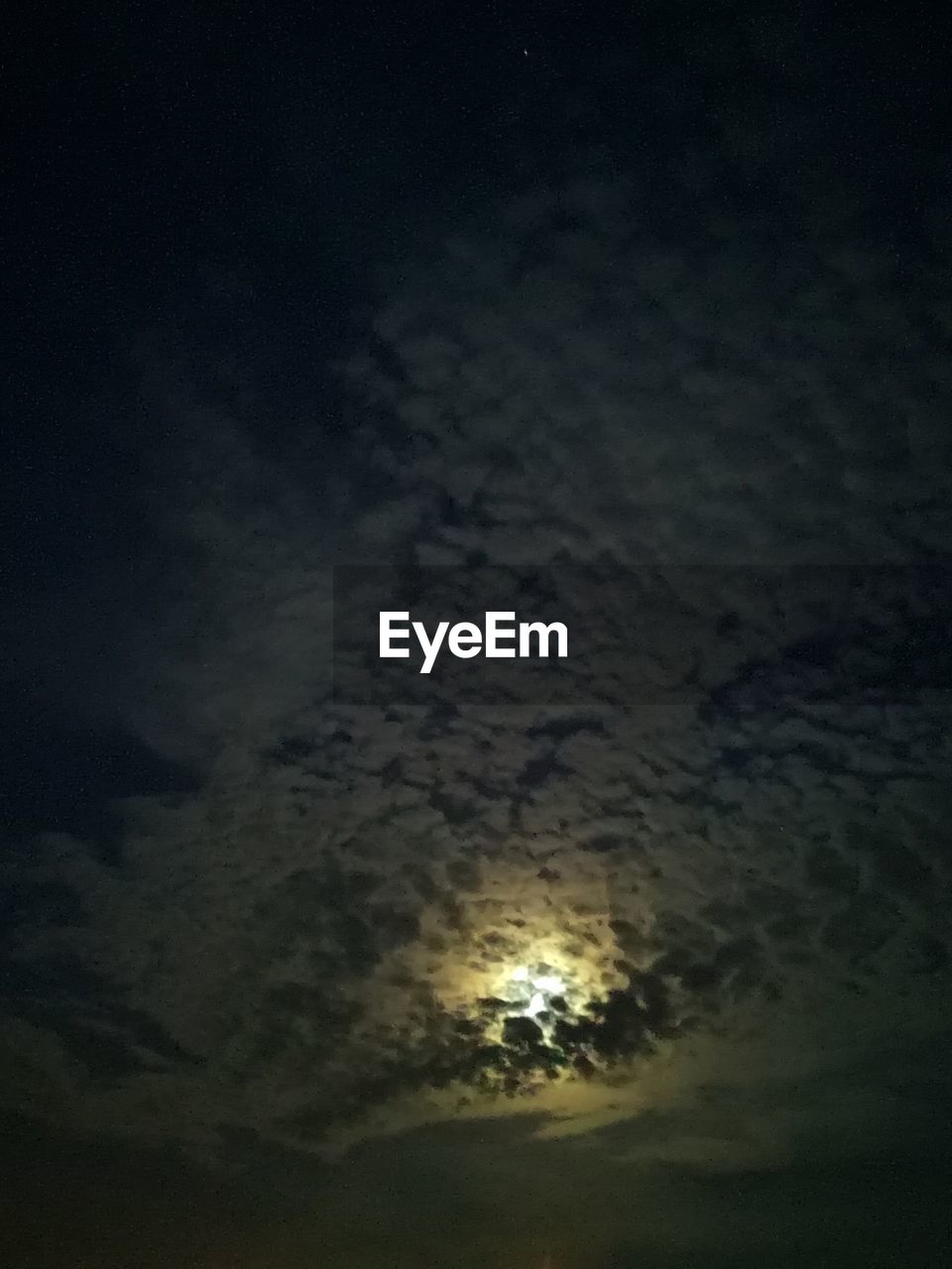 LOW ANGLE VIEW OF MOON AT SKY