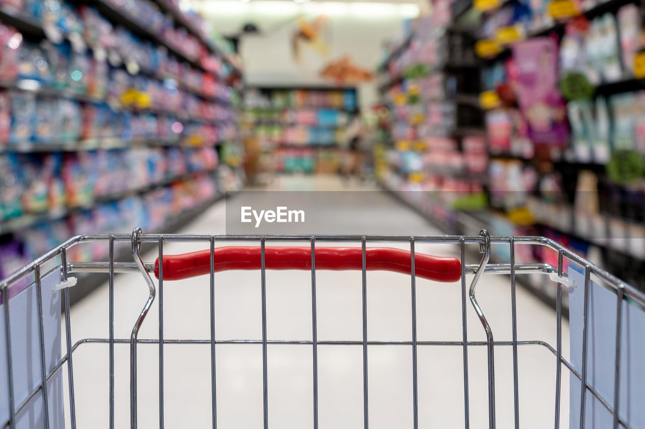 Close-up of shopping cart in supermarket