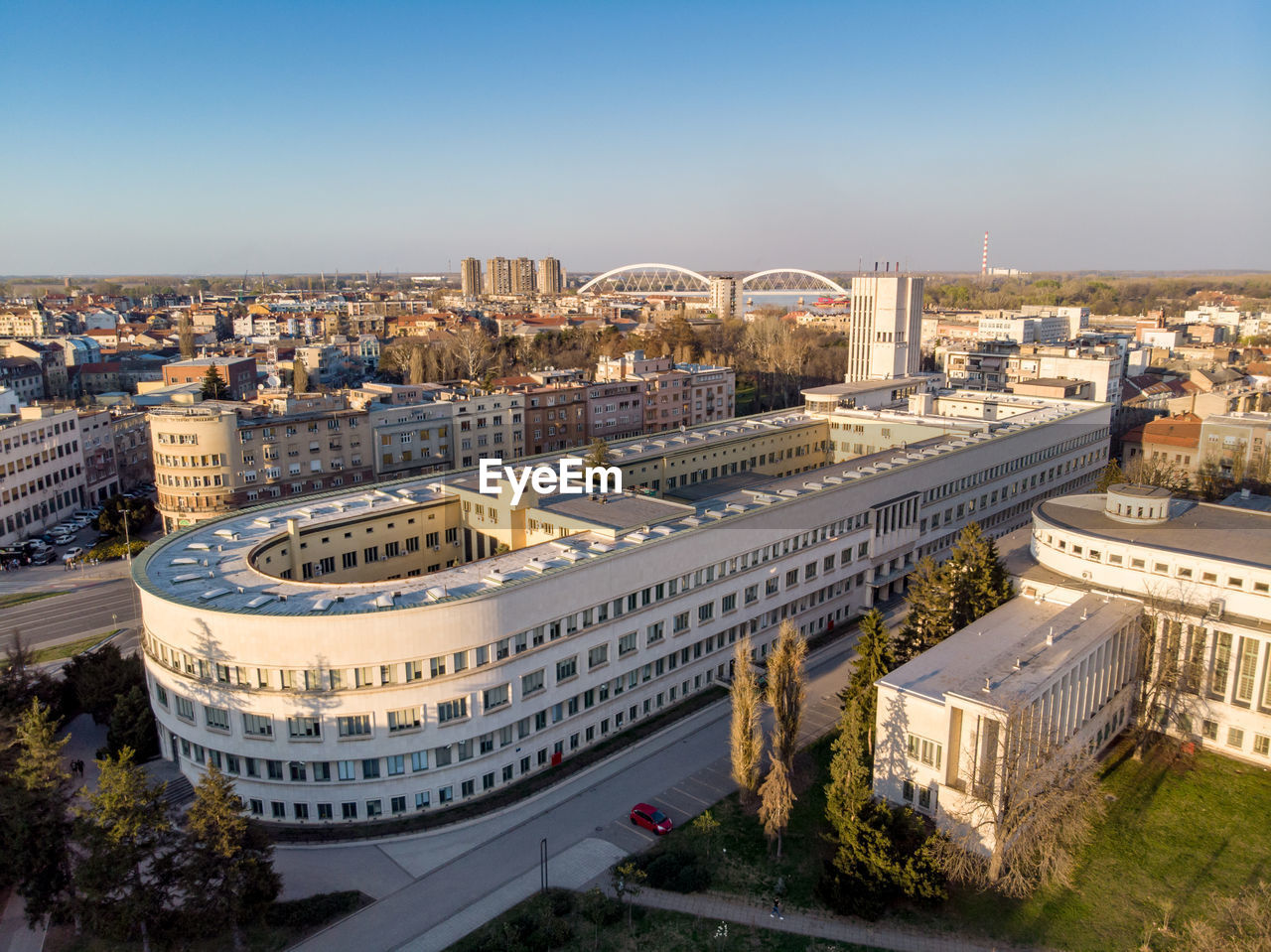 HIGH ANGLE VIEW OF BUILDINGS AGAINST CLEAR SKY