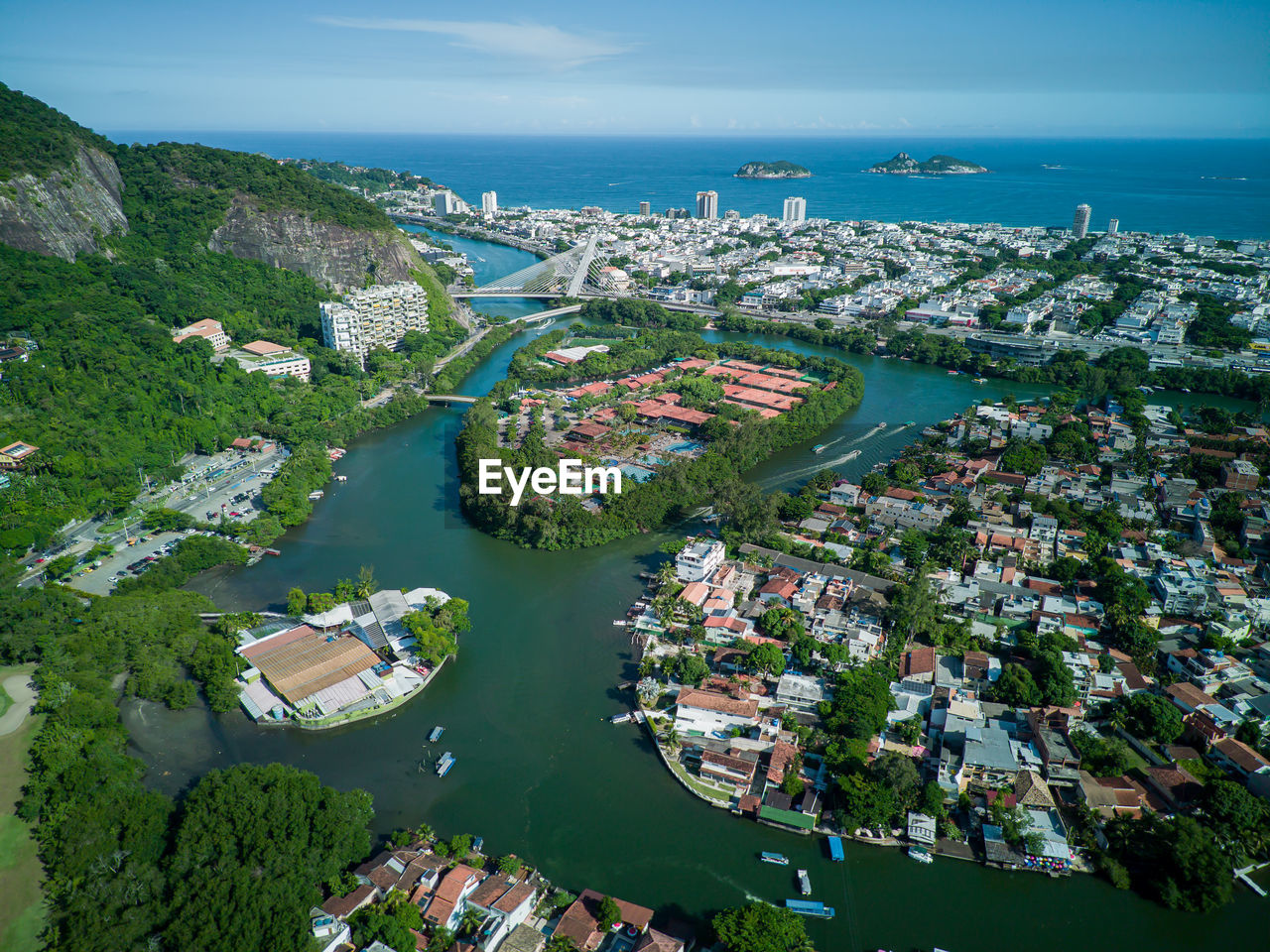 high angle view of townscape by sea