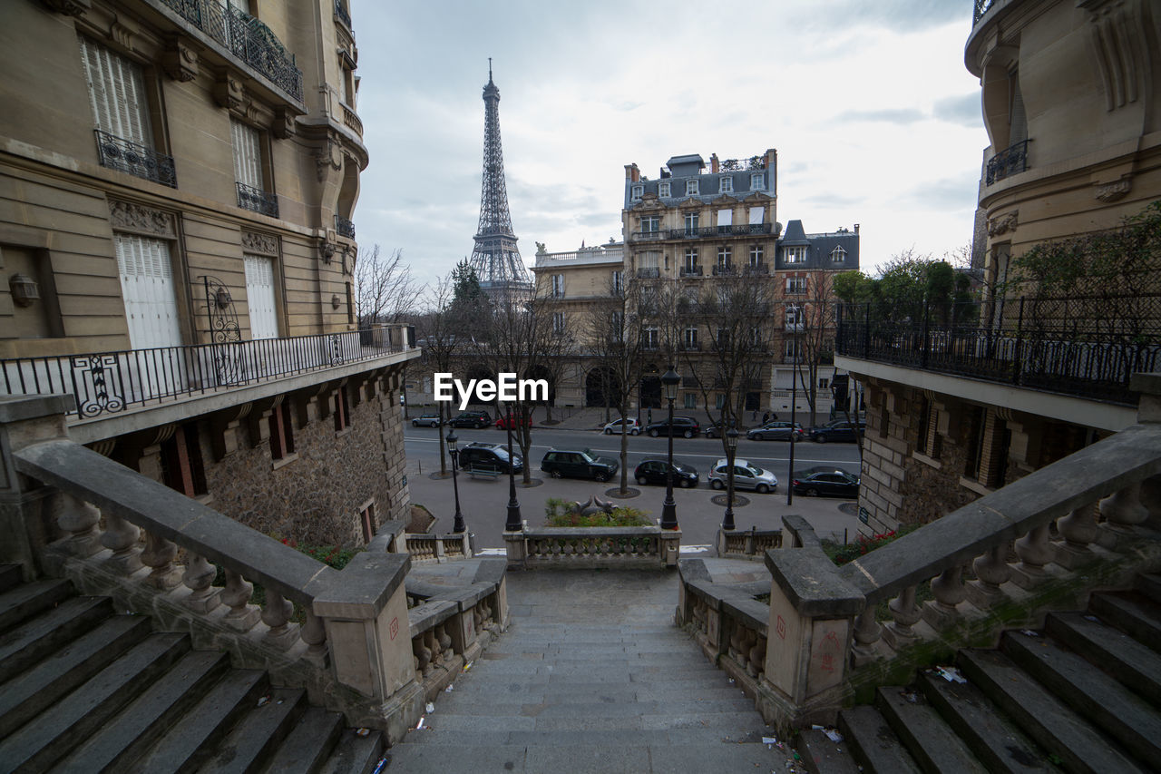 Eiffel tower against sky in city