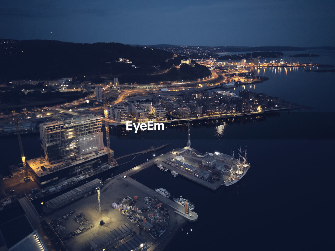 High angle view of illuminated city at night