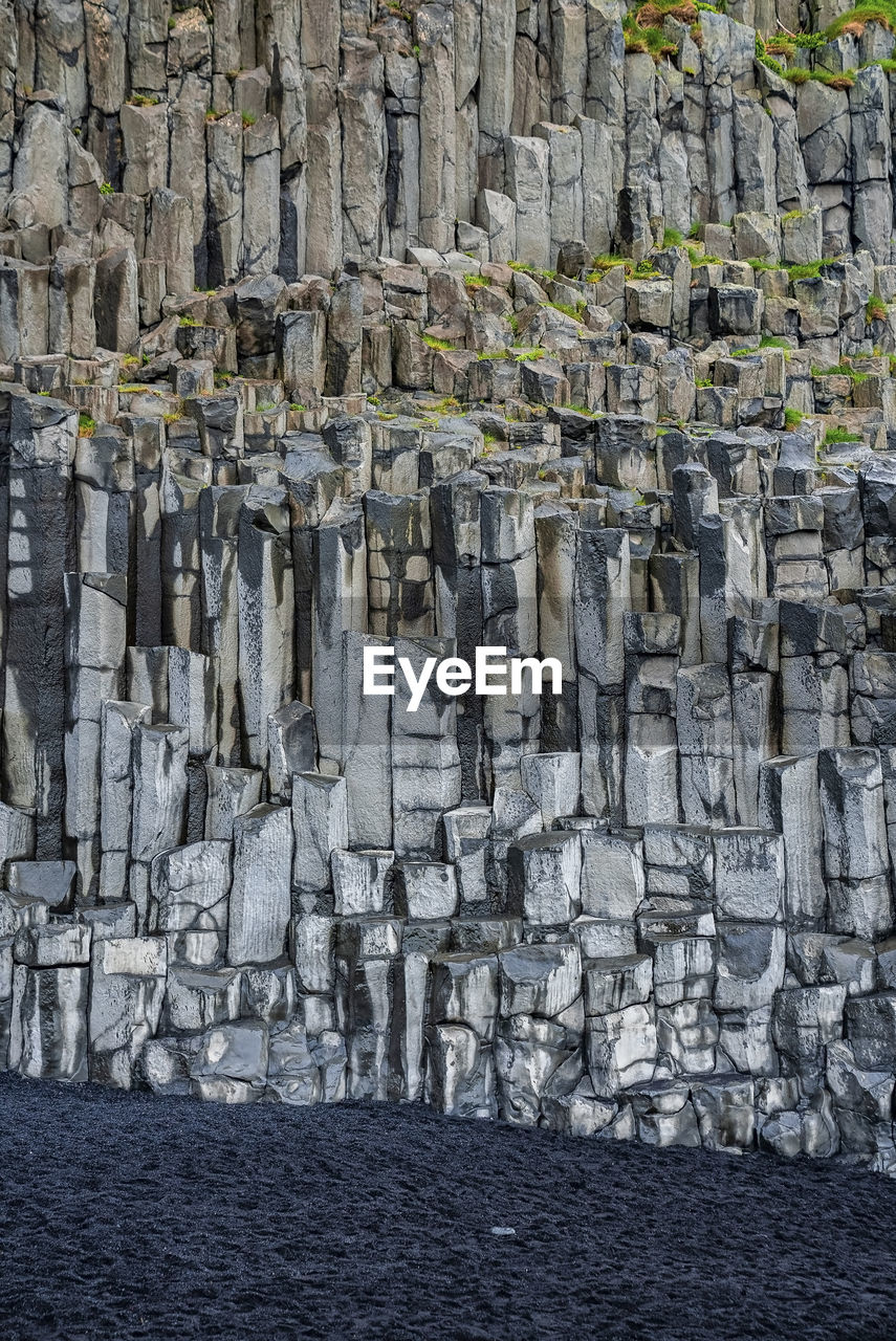 Beautiful majestic basalt column formation at famous reynisfjara beach