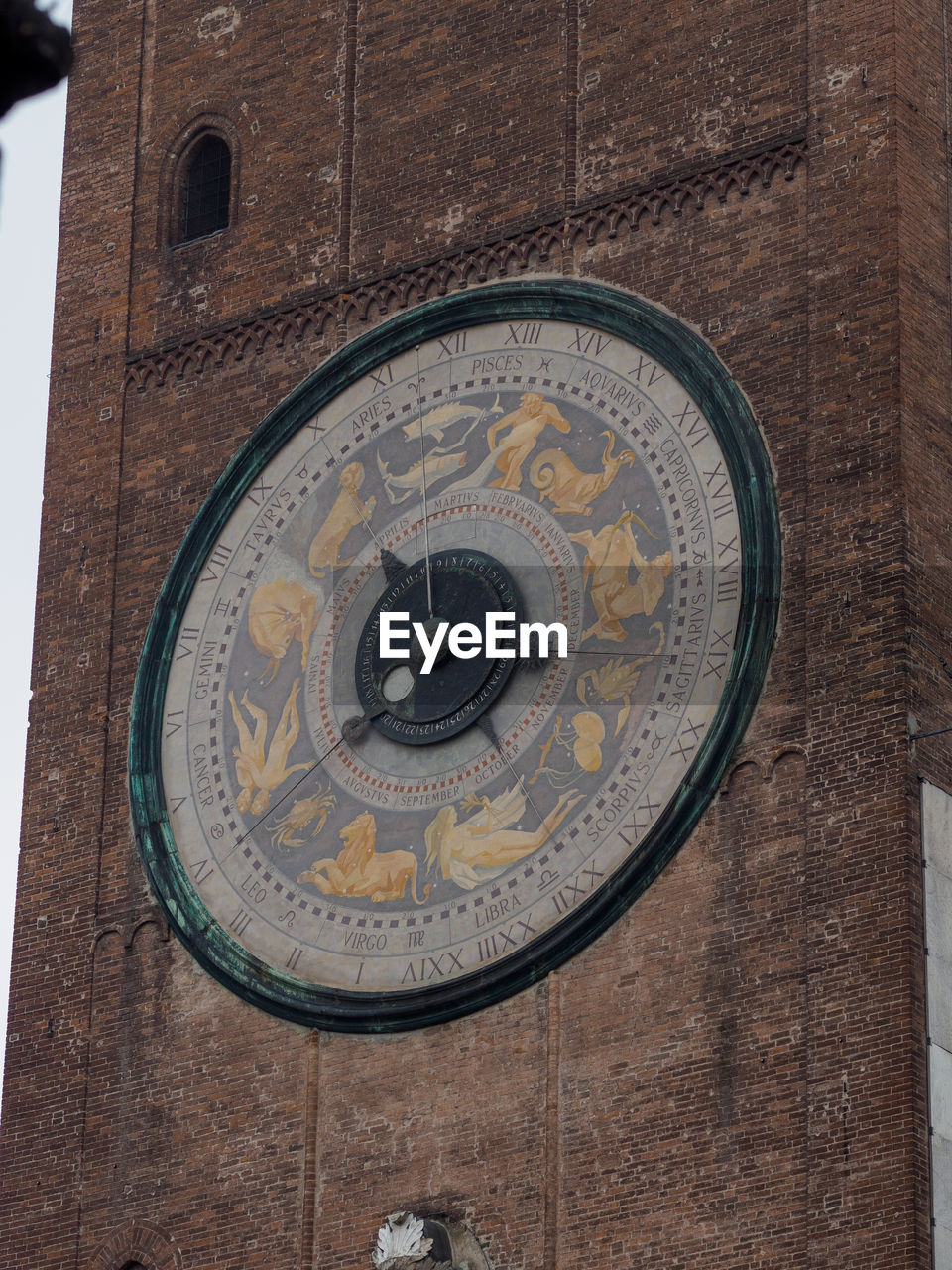 architecture, clock, time, no people, built structure, building exterior, clock tower, wood, tower, day, circle, ancient history, iron, history, roman numeral, building, the past, low angle view, travel destinations, geometric shape, religion, clock face, astronomy, space, art, close-up, place of worship
