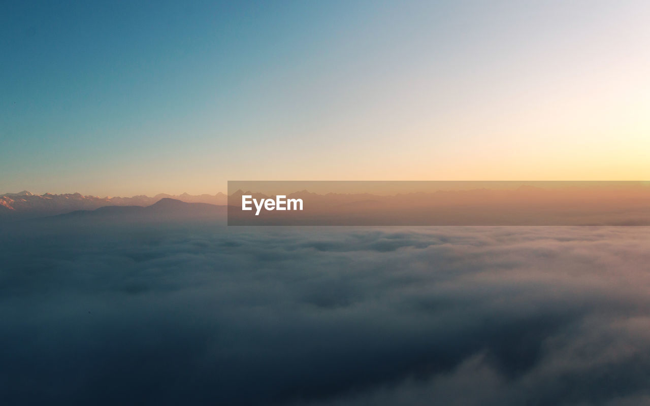 Scenic view of cloudscape against sky during sunset
