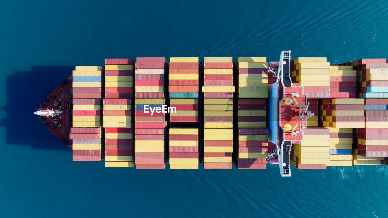 Aerial view of cargo containers loaded on ship